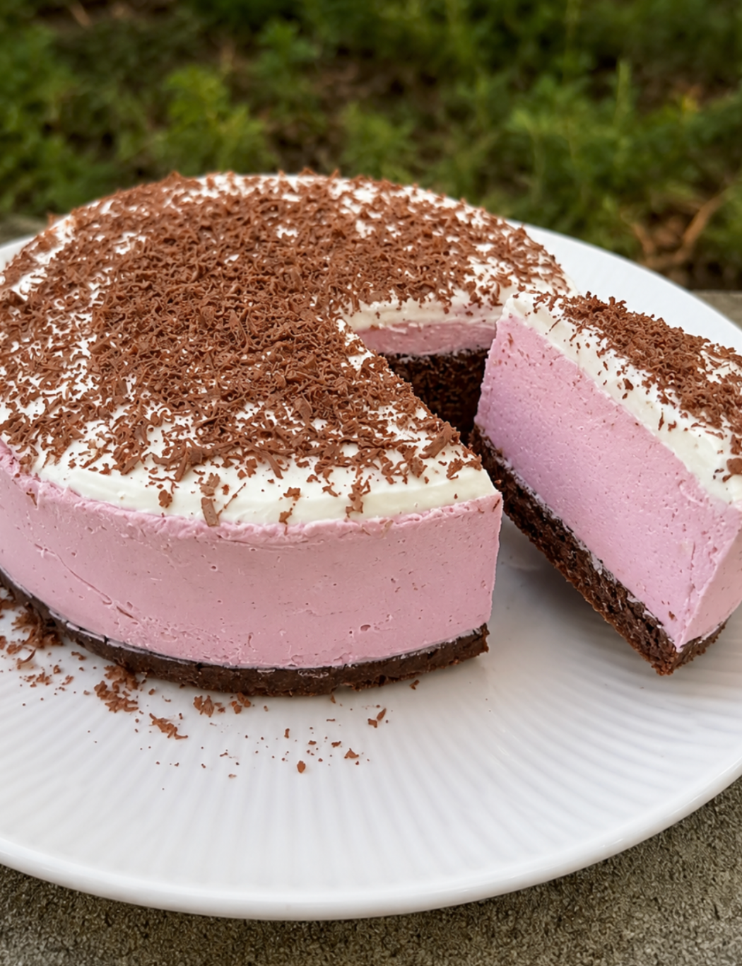 Fluffy Choc Mug Cake enveloped in Raspberry Cheesecake